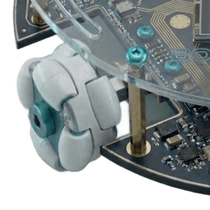 Close-up of an omni-wheel with its roller segments under the chassis edge